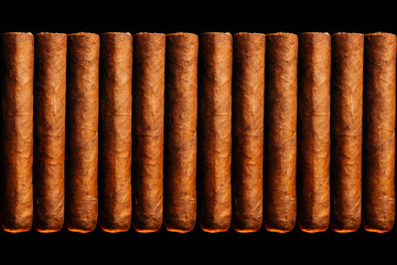 Cuban cigars on a wooden table closeup in a wooden humidore. A modern businessmans hobby.