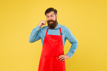 Hipster style. Inspired for changes. Man brutal bearded hipster with mustache wear apron....