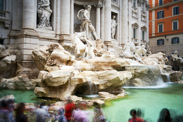 Trevi fountain in Rome, Italy. Trevi Fountain in Rome during the day surrounded by tourists.