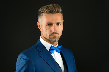 Handsome fashion model. handsome event manager. tuxedo man on black background. perfect male....