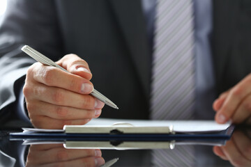 Focused photo on businessman that checking documents