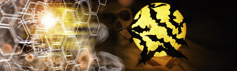 Black silhouettes of bats on a background of the moon. Halloween concept. Scary background....