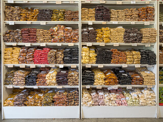 Dried fruit display racks in a shop.