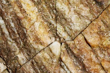 A block of quartz with several cracks. Close up.