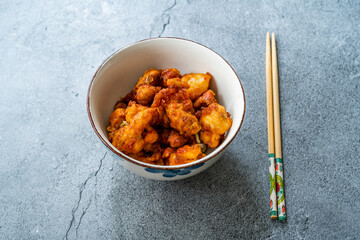 Stir Fry Mongolian Chicken with Chopsticks.
