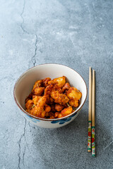 Stir Fry Mongolian Chicken with Chopsticks.
