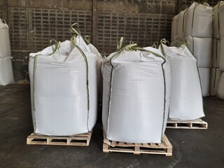 Chemical fertilizer Urea Stock pile jumbo-bag in warehouse waiting for shipment.