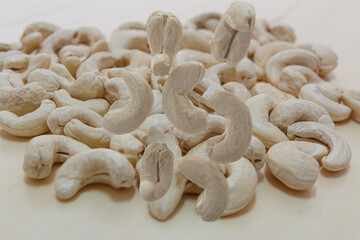 Cashew nuts falling on the wood floor