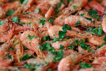 Fresh boiled prawns with coriander. A delicious dish of seafood.