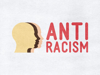 Anti-racism - Head and text on paper background.