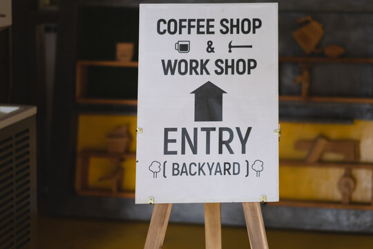 Sign bord entry of coffee shop and work shop at cafe.