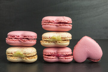 heart shaped macaroons  in pink and pale yellow