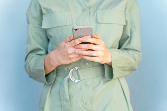 Close-up of woman using cell phone