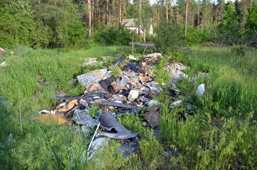 Spring landscape.Ecology of Ukraine. Nature near Ukrainian capital. Environmental contamination. Illegal junk dump.