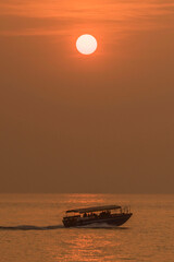 Red Sunset Over The Boat 