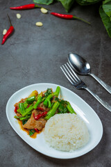 Stir fried kale with pork and hot smoky rice.