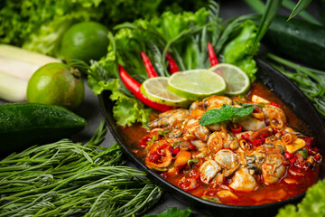 Spicy fresh oyster salad and Thai food ingredients