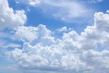 Bright blue sky with fluffy white clouds. Clearing day and Good weather. Blue sky background.