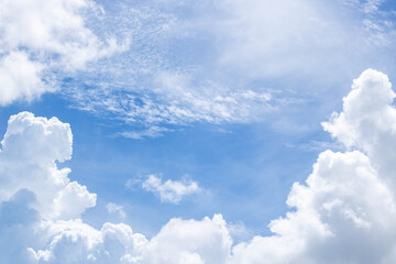 Bright blue sky with fluffy white clouds. Clearing day and Good weather. Blue sky background.