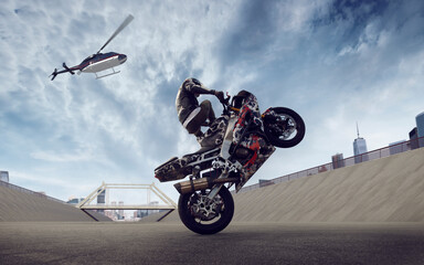 Moto rider making a stunt on his motorbike. Biker doing a difficult and dangerous stunt.