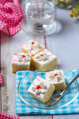 Vanilla cakes and chocolate cut into beautiful decorative pieces.