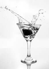 Martini drink glass ice splash 