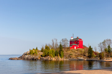 Red Lighthouse on Lake Superior in Upper Michigan - 354354089