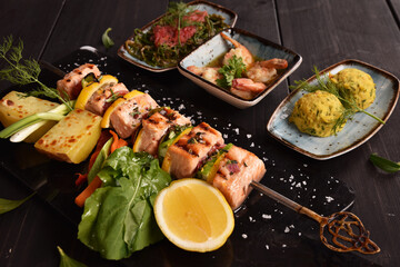 grilled salmon fish breast with vegetables
