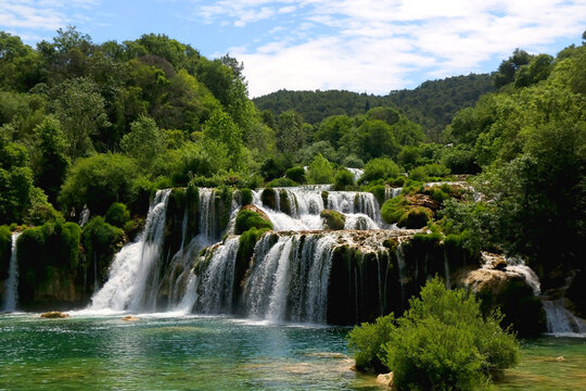 Beautiful waterfalls in National Park Krka, Croatia on a sunny summer day. © jelena990