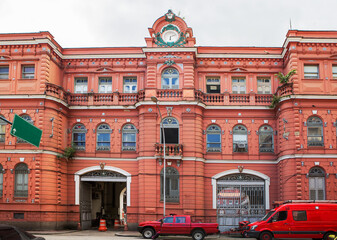 Fototapeta na wymiar Rio de Janeiro, Brazil, fire protection building. A beautiful red building where the city's fire Department is located.