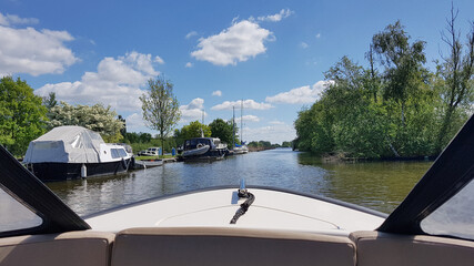 Sailing on a river - view from the boat
