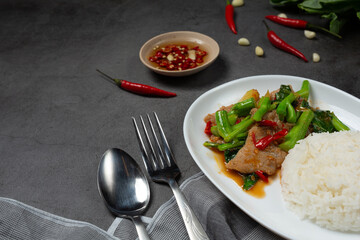 Stir fried kale with pork and hot smoky rice.