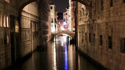 canal in Venice at night with bridge