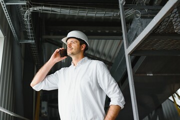Portrait of an engineer talking on the phone