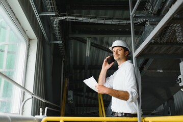 Portrait of an engineer talking on the phone