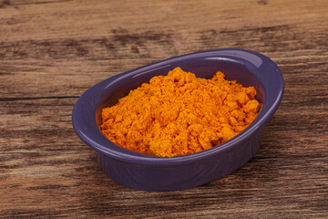 Tumeric powder in the bowl
