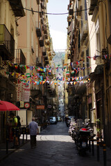 Fototapeta na wymiar Naples, Italy - August 12, 2018. Naples street by day.