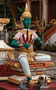 Green colored buddha image in a temple in Siamese Lao PDR, Southeast Asia