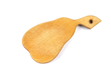 Old village kitchen chopping Board in the shape of a pear for food, isolated on a white background. Items for cooking. Kitchen utensils