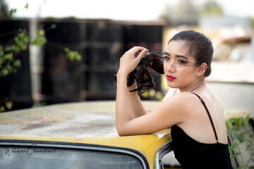 Beautiful Asian model in sexy dress,select focus.