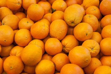 Selling ripe oranges in the market