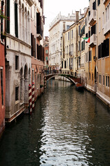 Fototapeta na wymiar View of the canal in the afternoon in Venice. Italy.