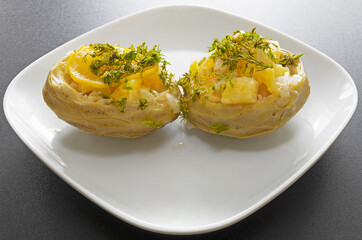 Homemade artichoke dish with potatoes, parsley and olive oil