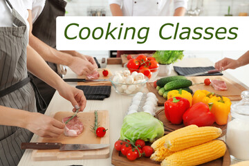 Cooking classes. Female chef preparing meat on wooden board at table, closeup