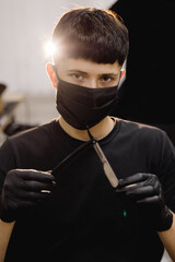 master barbershop with dangerous and sharp blade