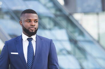 Fototapeta premium Businessman Looking Aside At Copyspace Posing In Urban Area Indoors