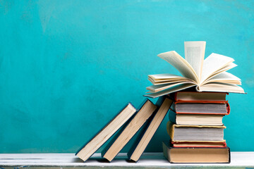 Books on wooden desk table and abstract background. Education background. Copy Space. Back to school.