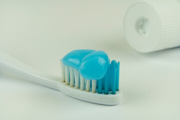 Old toothbrush on a white background