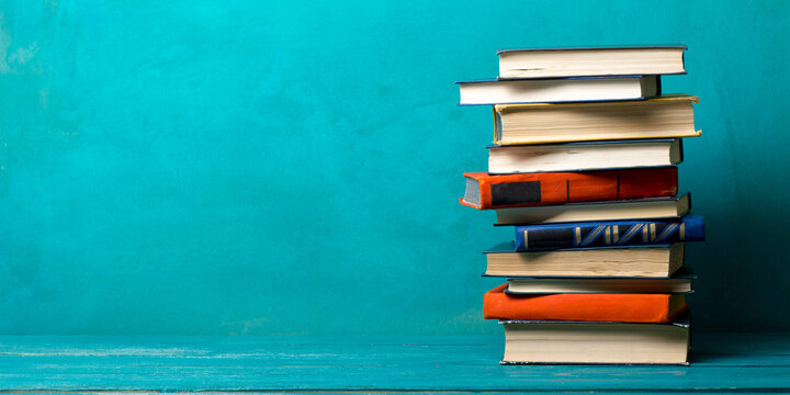 Books on wooden desk table and abstract background. Education background. Copy Space. Back to school.