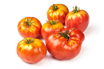 Fresh rustic tomatoes, isolated on white background